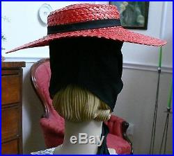 1940`s Red Straw Hat with Black tie on detail Beresford design