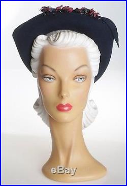 1940s Unique Shaped Navy Felt Hat with Curved Halo Brim Enhanced by Wine Florals