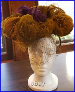 Ruthie's multicolored 1940's ostrich feather hat with veil Des Moines lore