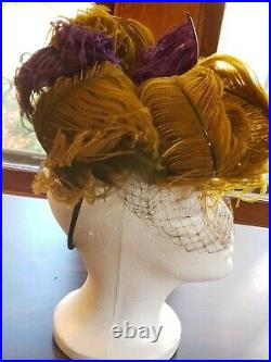 Ruthie's multicolored 1940's ostrich feather hat with veil Des Moines lore