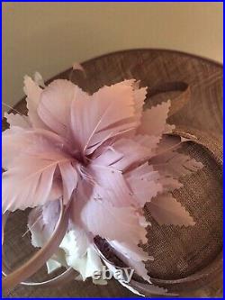 Very large lilac vintage woman's hat with magnificent decoration. Brand Giovannio