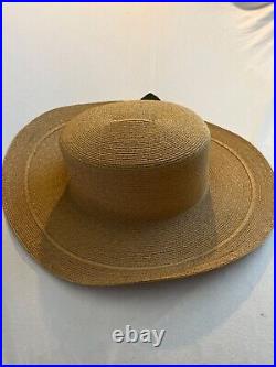 Vintage beige straw hat with ribbon and purple flowers made in China 1910