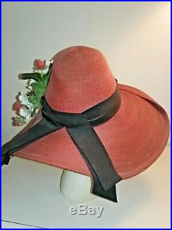 Vintage late 1930's, early 1940's wide brim straw hat with flowers. Garfinkle Co