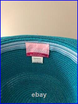 Vintage woman's aquamarine hat with a small bow. Brand Scala, Paperbraid