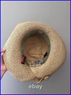 Vintage woman's beige hat decorated with buttons. Brand Jean Patou, France