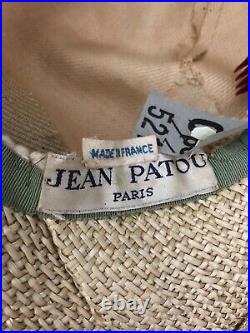 Vintage woman's beige hat decorated with buttons. Brand Jean Patou, France