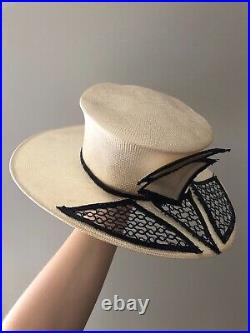 Vintage woman's beige hat with a black decor. Brand Chapeau Creations, Straw