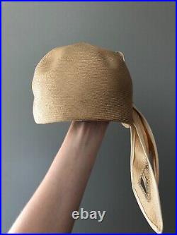 Vintage woman's beige hat with a bow and sequins. Brand Mr. John, Straw