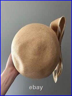 Vintage woman's beige hat with a bow and sequins. Brand Mr. John, Straw