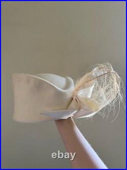 Vintage woman's beige hat with bow. Brand Jack McConnell, Wool