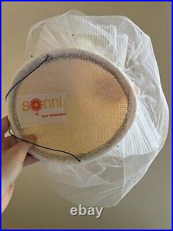 Vintage woman's beige hat with guipure fabric. Brand Sonni of San Francisco