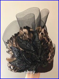 Vintage woman's black hat with feathers and beads. Brand Brenda Waites Bolling