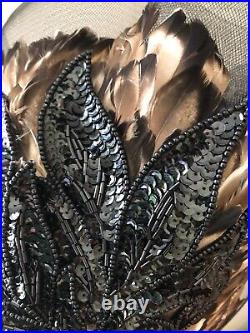 Vintage woman's black hat with feathers and beads. Brand Brenda Waites Bolling