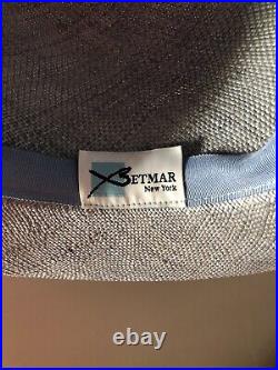 Vintage woman's blue hat with bow and decor. Brand Betmar, New York. Straw