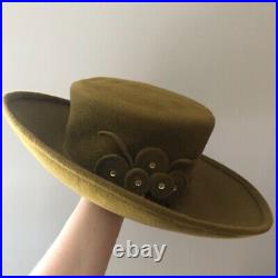 Vintage woman's brown hat with decor. Brand George Zamau'l, New York