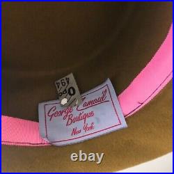 Vintage woman's brown hat with decor. Brand George Zamau'l, New York