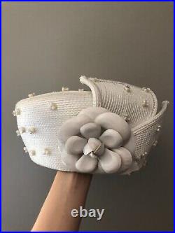 Vintage woman's deep white hat with beads and flower. Brand Carlos, Straw