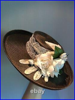 Vintage woman's green hat with flowers and a lace glove. Brand Sonni, Straw