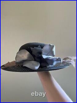 Vintage woman's grey hat with decoration. Brand Don Anderson, Wool