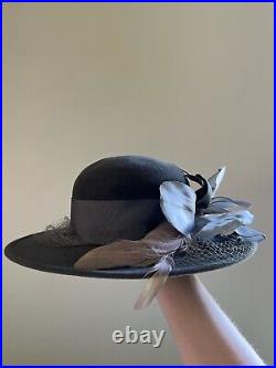 Vintage woman's grey hat with decoration. Brand Don Anderson, Wool
