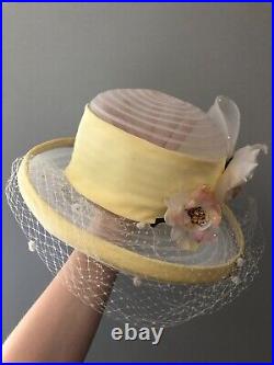 Vintage woman's hat with yellow ribbon and decor. Brand Whittall & Shon, Straw