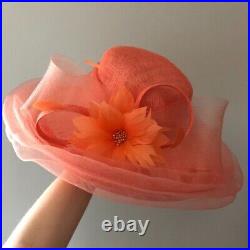 Vintage woman's peach hat with beautiful flower and decor. Brand Giovannio, Straw