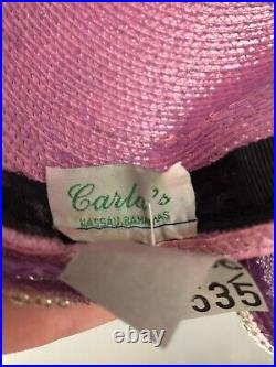 Vintage woman's pink hat with a large decor and sequins. Straw. Nassau, Bahamas