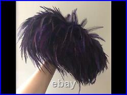 Vintage woman's purple hat with feathers. Brand Be a Polk, Wool base