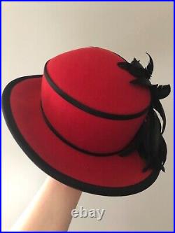 Vintage woman's red hat with black feathers. Brand Chapeau Creations, Wool