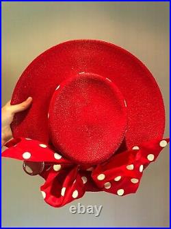 Vintage woman's red hat with ribbon with white polka dots. Brand Frank Olive