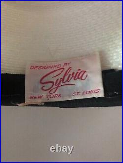 Vintage woman's white hat with a black rose. Brand Sylvia, St. Louis, Straw