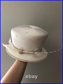 Vintage woman's white hat with feather and sequins. Brand Mr. Song Millinery