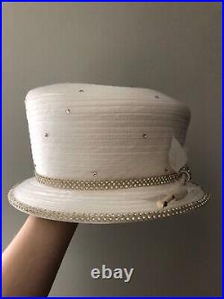 Vintage woman's white hat with feather and sequins. Brand Mr. Song Millinery
